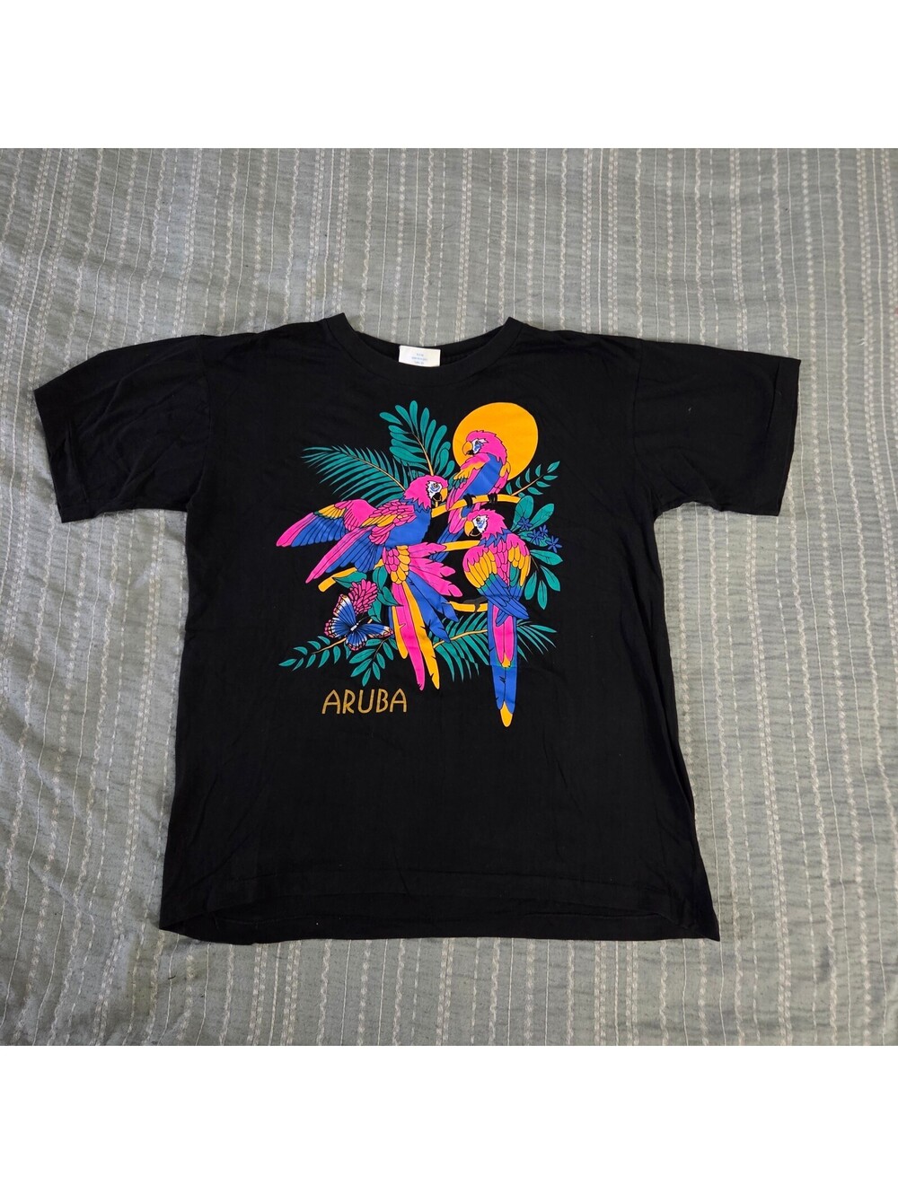 Aruba black graphic T shirt with colourful parrot print